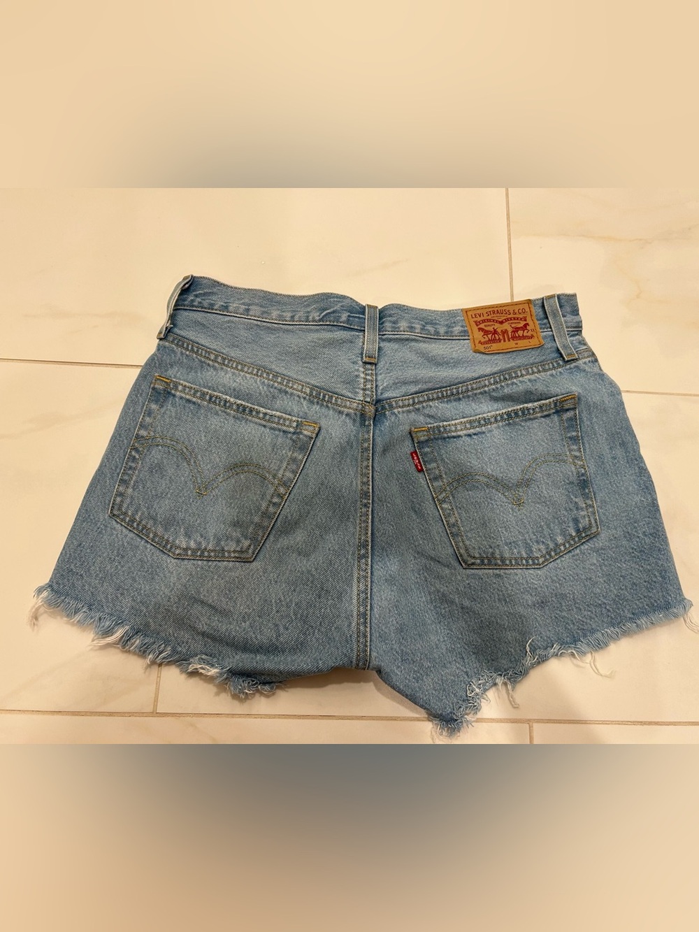 Levi's Light Blue Frayed Hem Denim Shorts